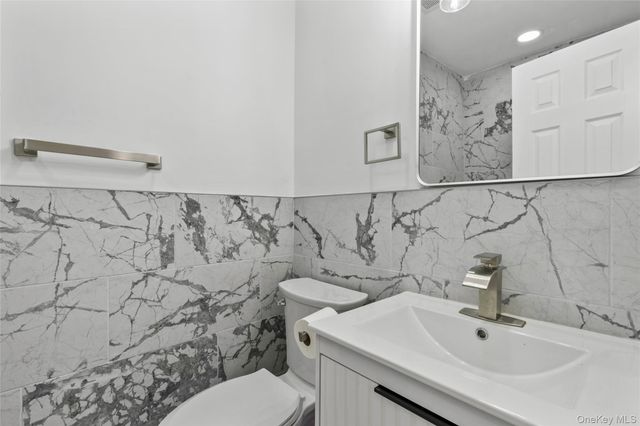 8 Marc Drive, Ridge, NY 11961