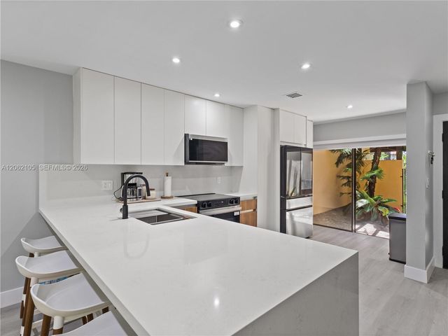 9853 Costa Del Sol Boulevard 103F, Doral, FL 33178
