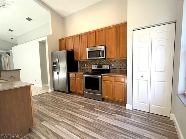 1356 Triandra LN, Naples, FL 34119