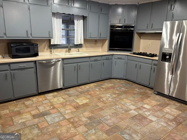 4082 STONEMONT Drive, Lilburn, GA 30047