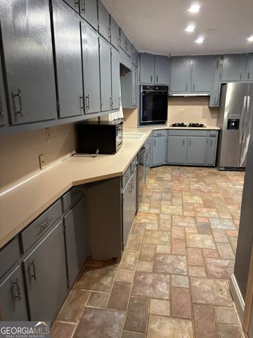 4082 STONEMONT Drive, Lilburn, GA 30047