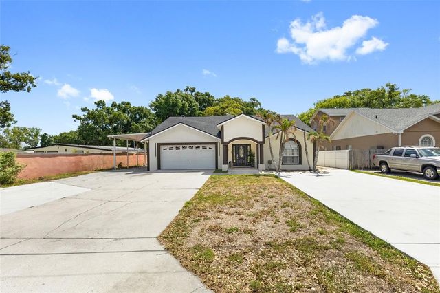8019 N GOMEZ AVENUE, Tampa, FL 33614