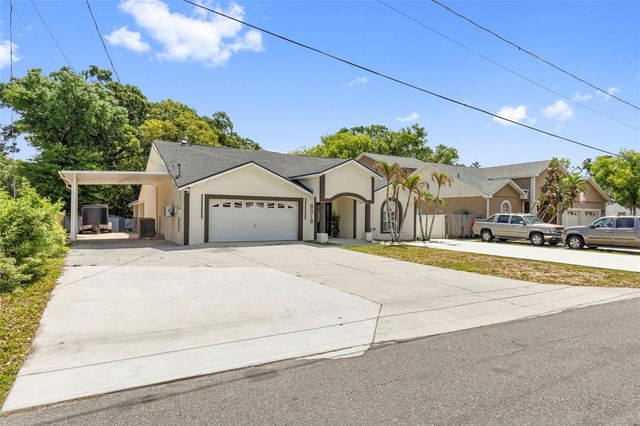 8019 N GOMEZ AVENUE, Tampa, FL 33614