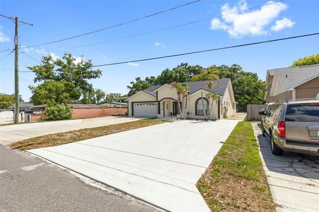 8019 N GOMEZ AVENUE, Tampa, FL 33614
