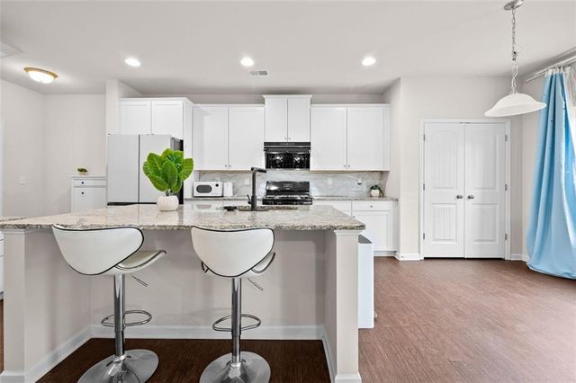 1876 HANOVER WEST Drive, Lawrenceville, GA 30043