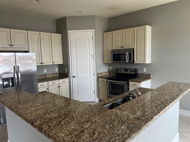 13124 WOODFORD STREET, Orlando, FL 32832