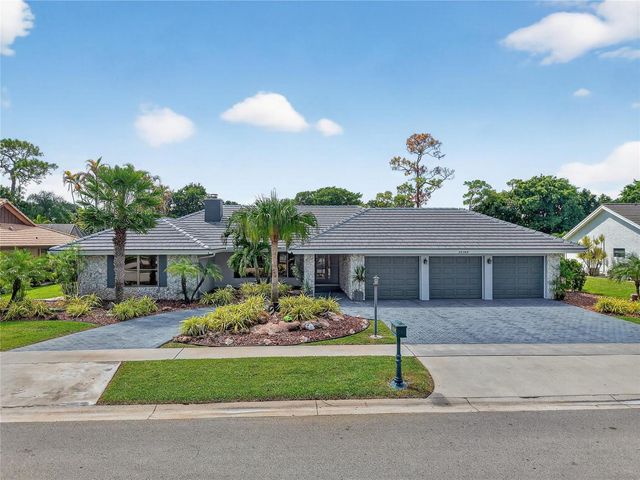10182 Boca Woods Lane, Boca Raton, FL 33428