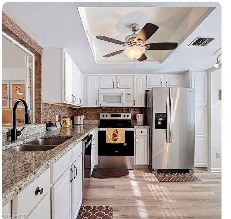 627 Serendipity DR 627, NAPLES, FL 34108 — photo 4