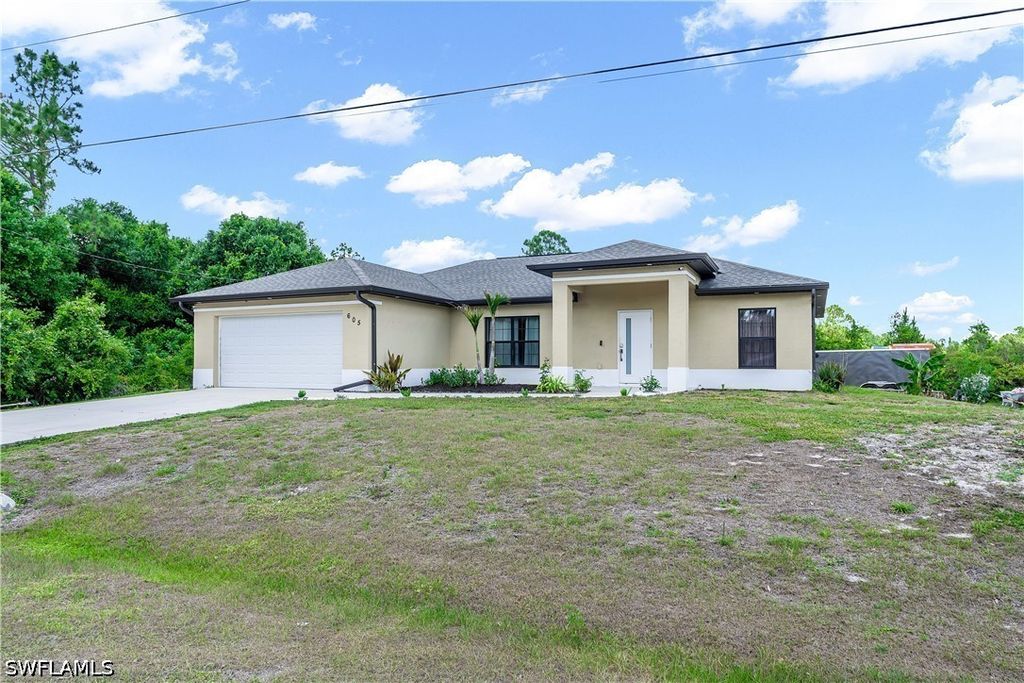 605 E 11th ST, Lehigh Acres, FL 33972