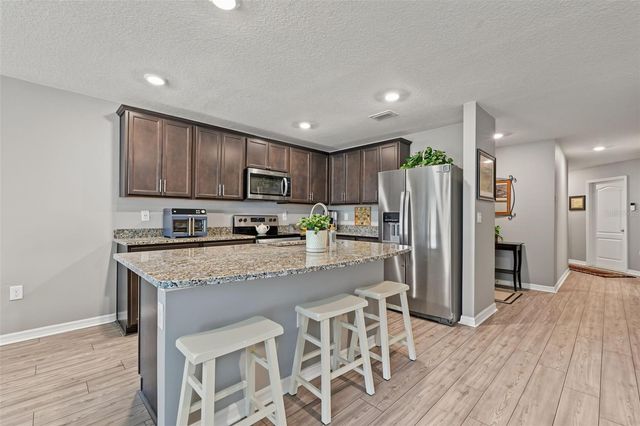 8951 SOUTHERN CHARM CIRCLE, Brooksville, FL 34613