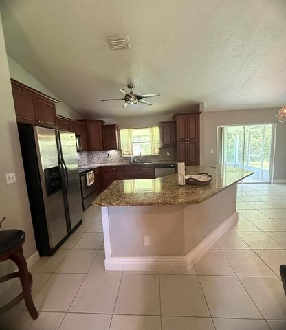 2397 SW Lejune Street, Port St. Lucie, FL 34953