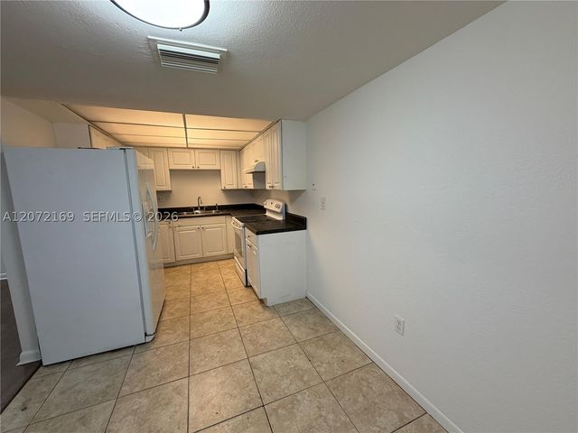 11101 Royal Palm Blvd 203, Coral Springs, FL 33065