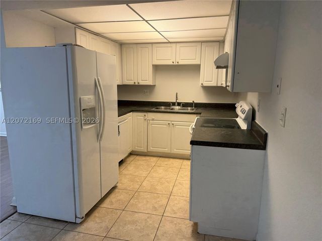 11101 Royal Palm Blvd 203, Coral Springs, FL 33065