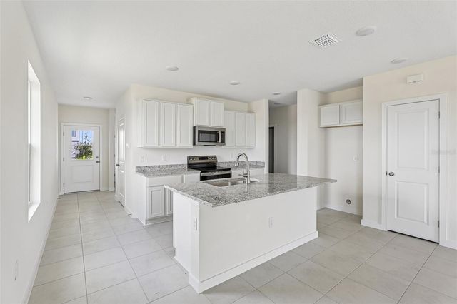 1940 DIAMOND HEAD CIRCLE, Haines City, FL 33844