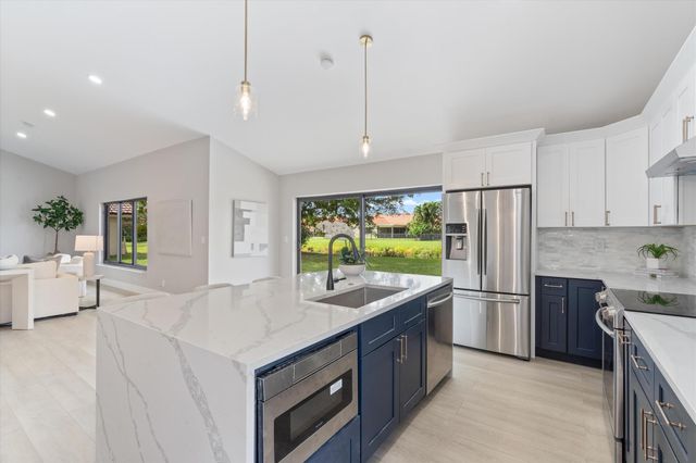 9471 Sun Pointe Drive, Boynton Beach, FL 33437