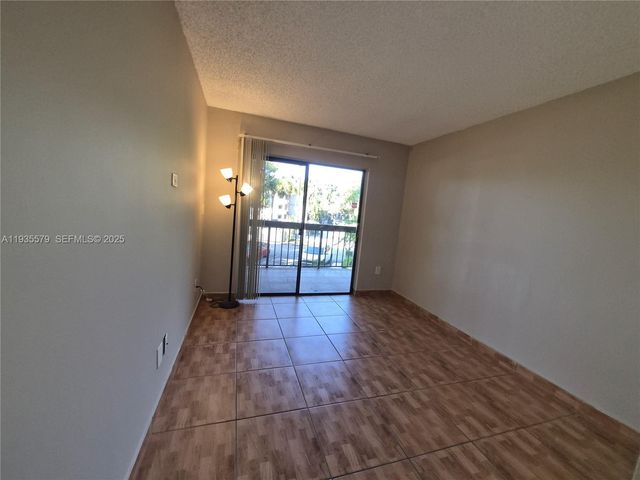 8811 SW 132nd Pl 203CW, Miami, FL 33186