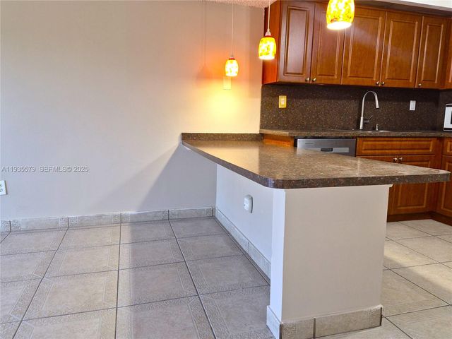 8811 SW 132nd Pl 203CW, Miami, FL 33186