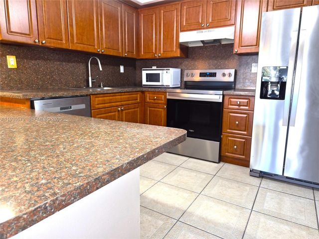 8811 SW 132nd Pl 203CW, Miami, FL 33186