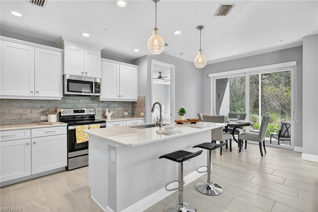 2554 SEYCHELLES DR 904, NAPLES, FL 34112 — exterior