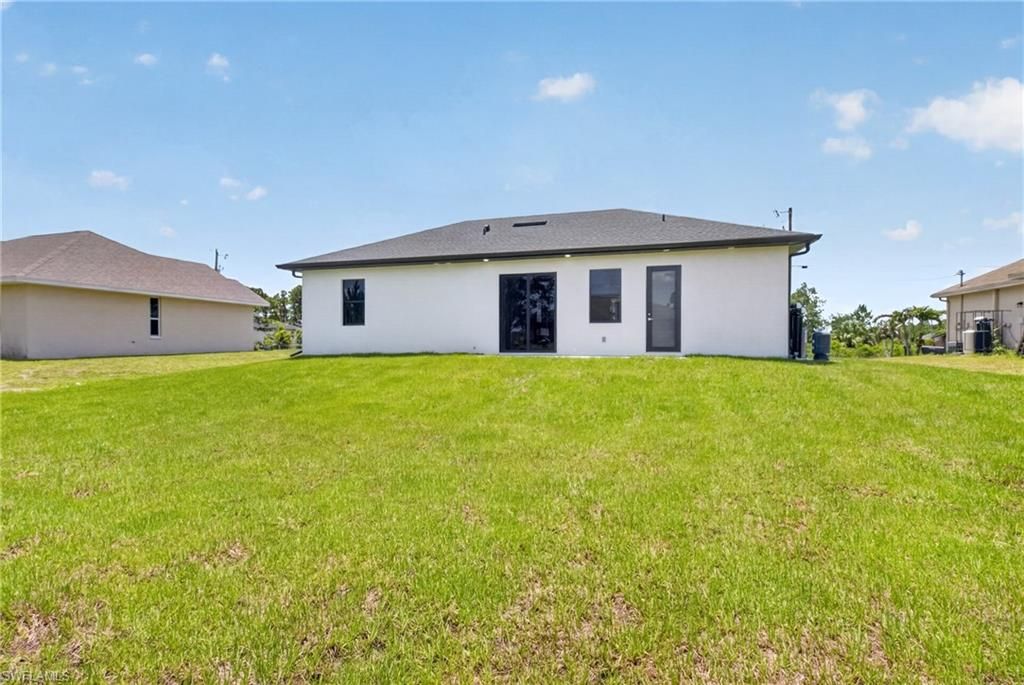 1213 Dodwin ST E, LEHIGH ACRES, FL 33974 — photo 4