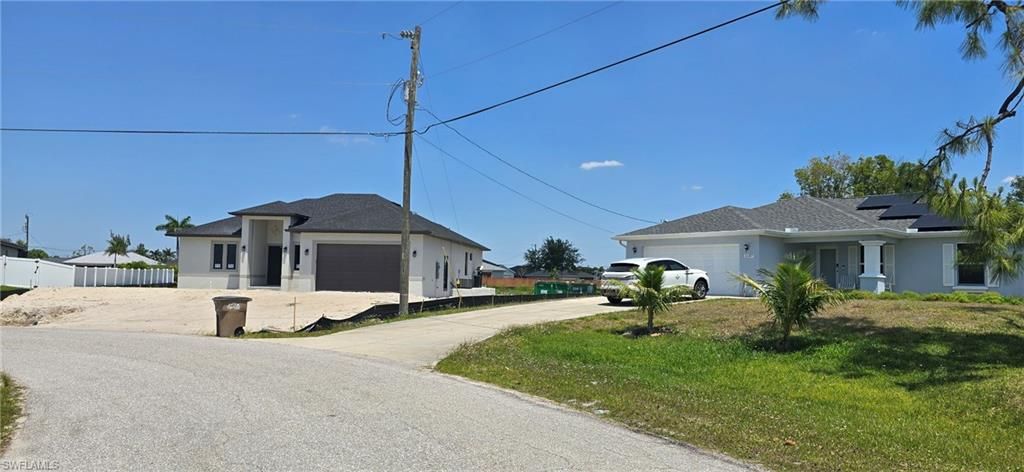 1153 NW 28th AVE, CAPE CORAL, FL 33993 — photo 3