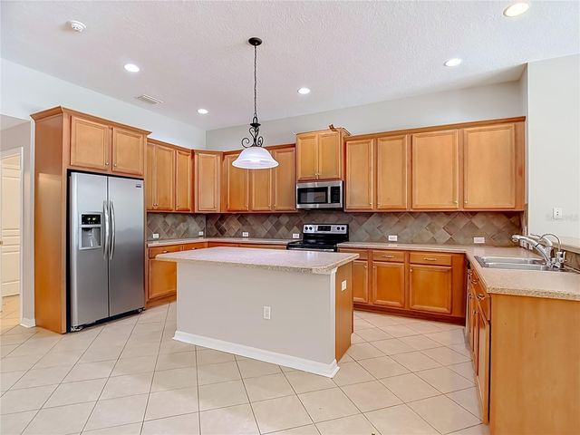 7220 NIGHT HERON DRIVE, Land O Lakes, FL 34637