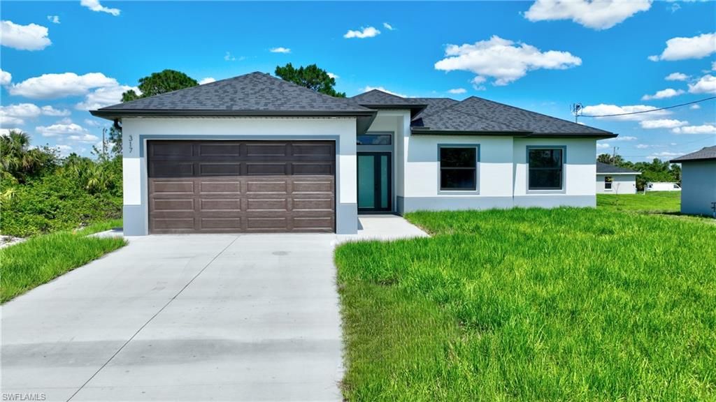 317 Lancelot AVE, LEHIGH ACRES, FL 33974 — exterior