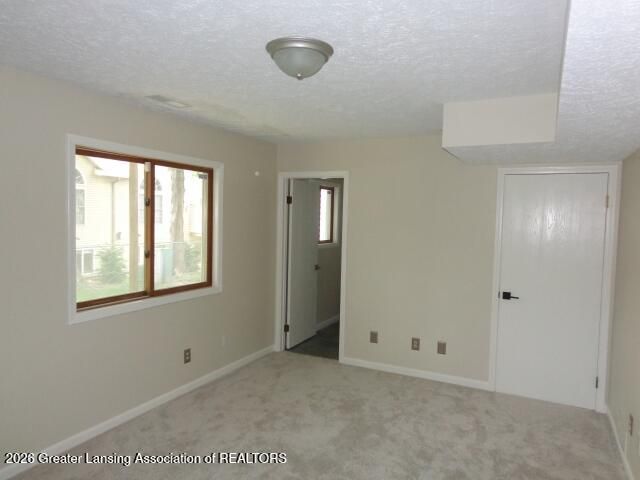 5041 W Willoughby Road 7, Holt, MI 48842