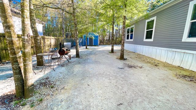 323 County Road 3400, Cleveland, TX 77327