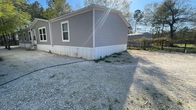 323 County Road 3400, Cleveland, TX 77327