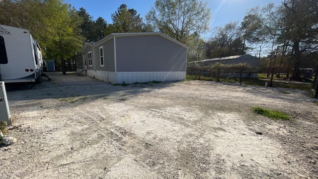 323 County Road 3400, Cleveland, TX 77327