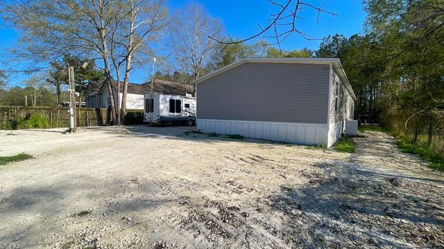 323 County Road 3400, Cleveland, TX 77327