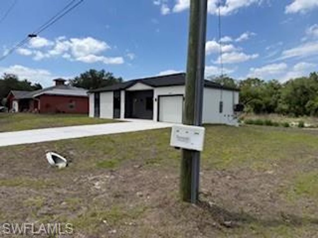 1907 15th ST, LEHIGH ACRES, FL 33972 — photo 3