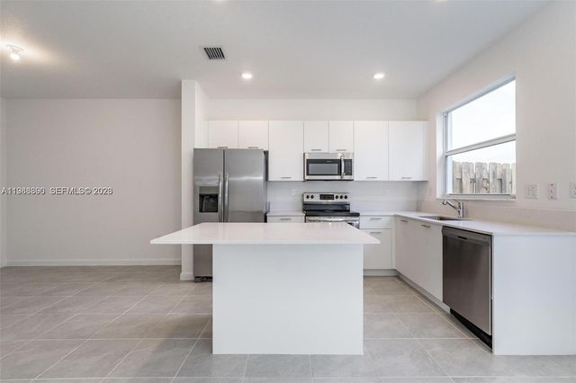 12313 NW 23rd Court, Miami, FL 33167