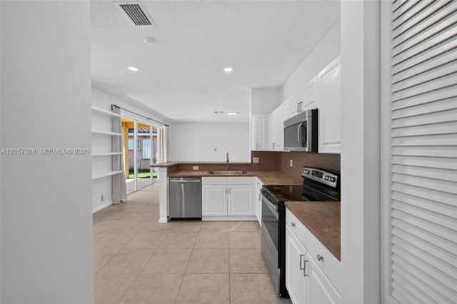 498 Cambridge Ln, Weston, FL 33326