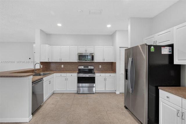 498 Cambridge Ln, Weston, FL 33326