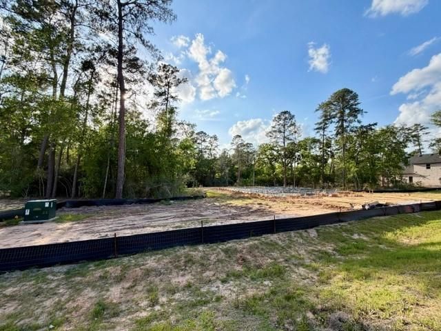 323 Louvenia Court, Pinehurst, TX 77362