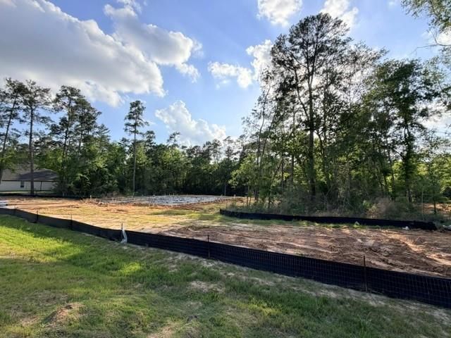 323 Louvenia Court, Pinehurst, TX 77362