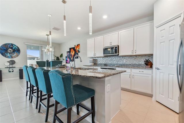 9309 RALLY SPRING LOOP, Wesley Chapel, FL 33545