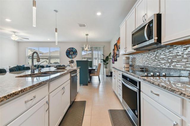 9309 RALLY SPRING LOOP, Wesley Chapel, FL 33545