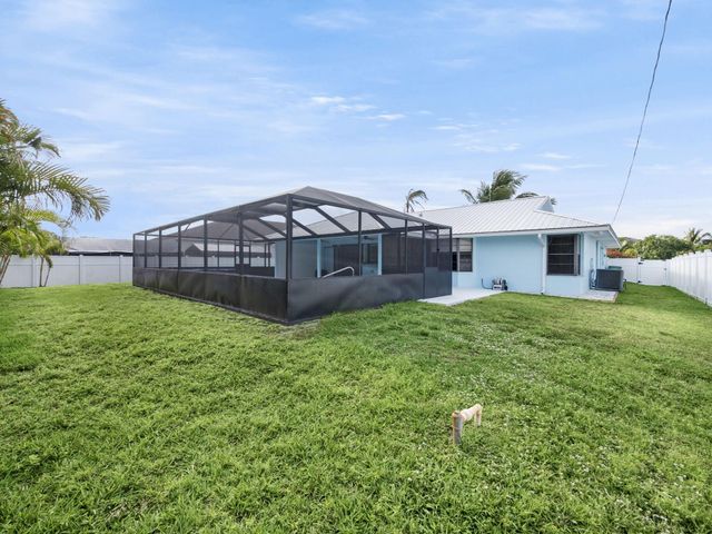 1409 SW Aachen Avenue, Port St Lucie, FL 34953
