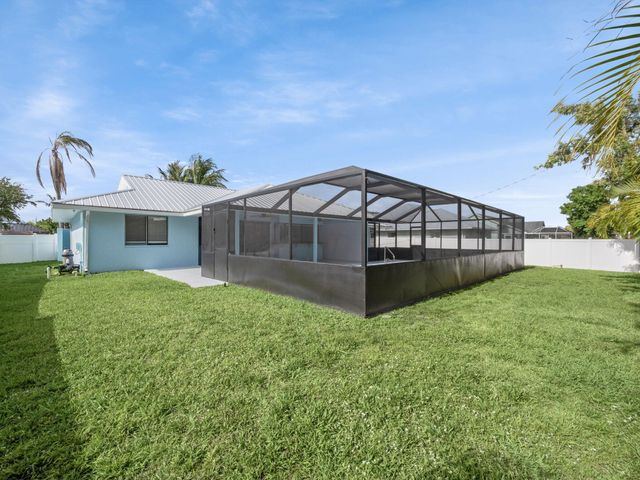 1409 SW Aachen Avenue, Port St Lucie, FL 34953