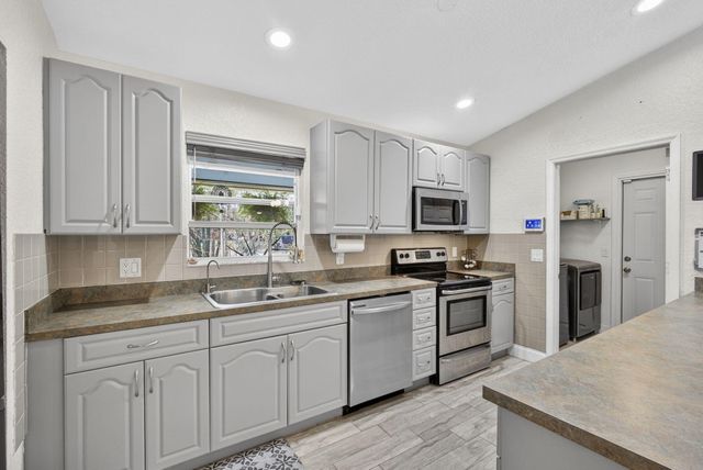 16087 E Pleasure Drive, The Acreage, FL 33470