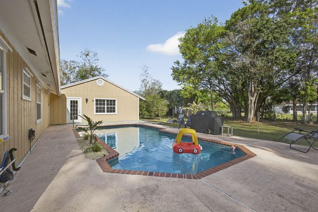 16087 E Pleasure Drive, The Acreage, FL 33470