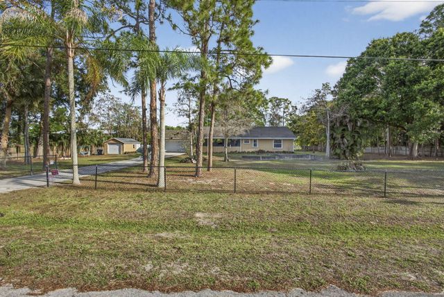 16087 E Pleasure Drive, The Acreage, FL 33470