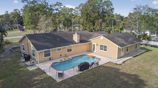 16087 E Pleasure Drive, The Acreage, FL 33470