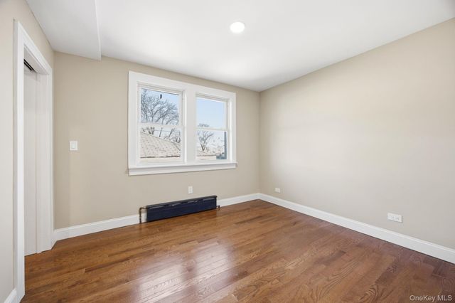 3033 93rd Street, East Elmhurst, NY 11369