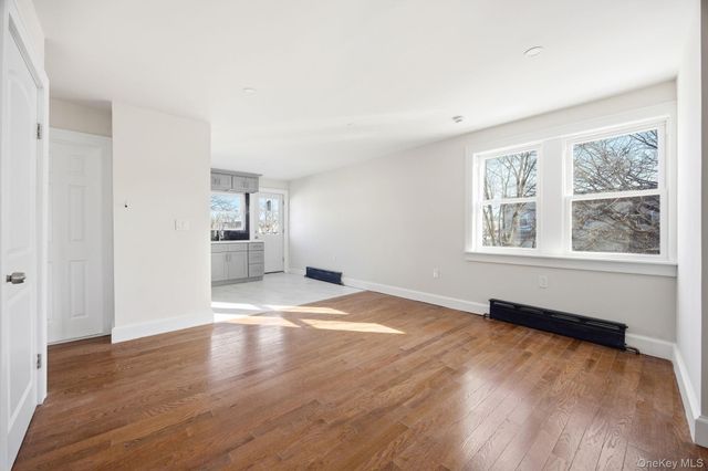 3033 93rd Street, East Elmhurst, NY 11369