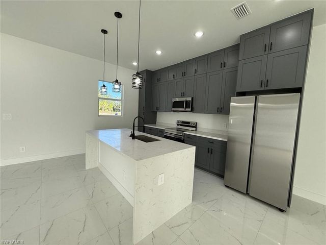 1121 Florence ST E, Lehigh Acres, FL 33974