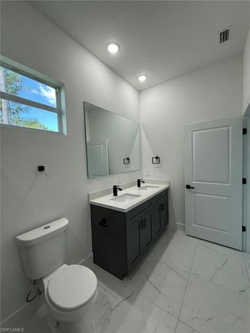 1121 Florence ST E, Lehigh Acres, FL 33974